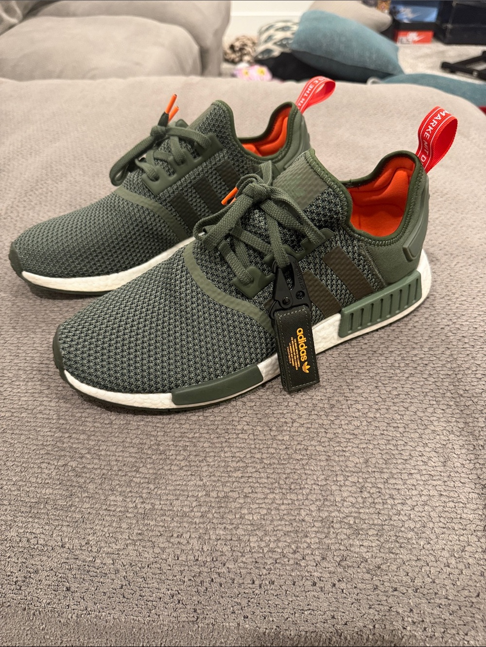 adidas Men's NMD_R1 Sneakers in Olive Green with Orange Accents